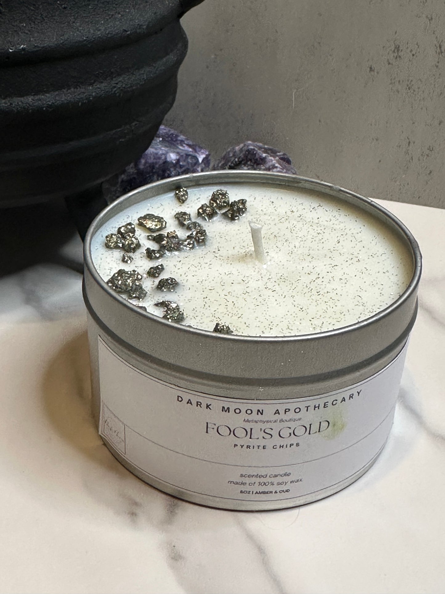 tin candle with pyrite crystal chips