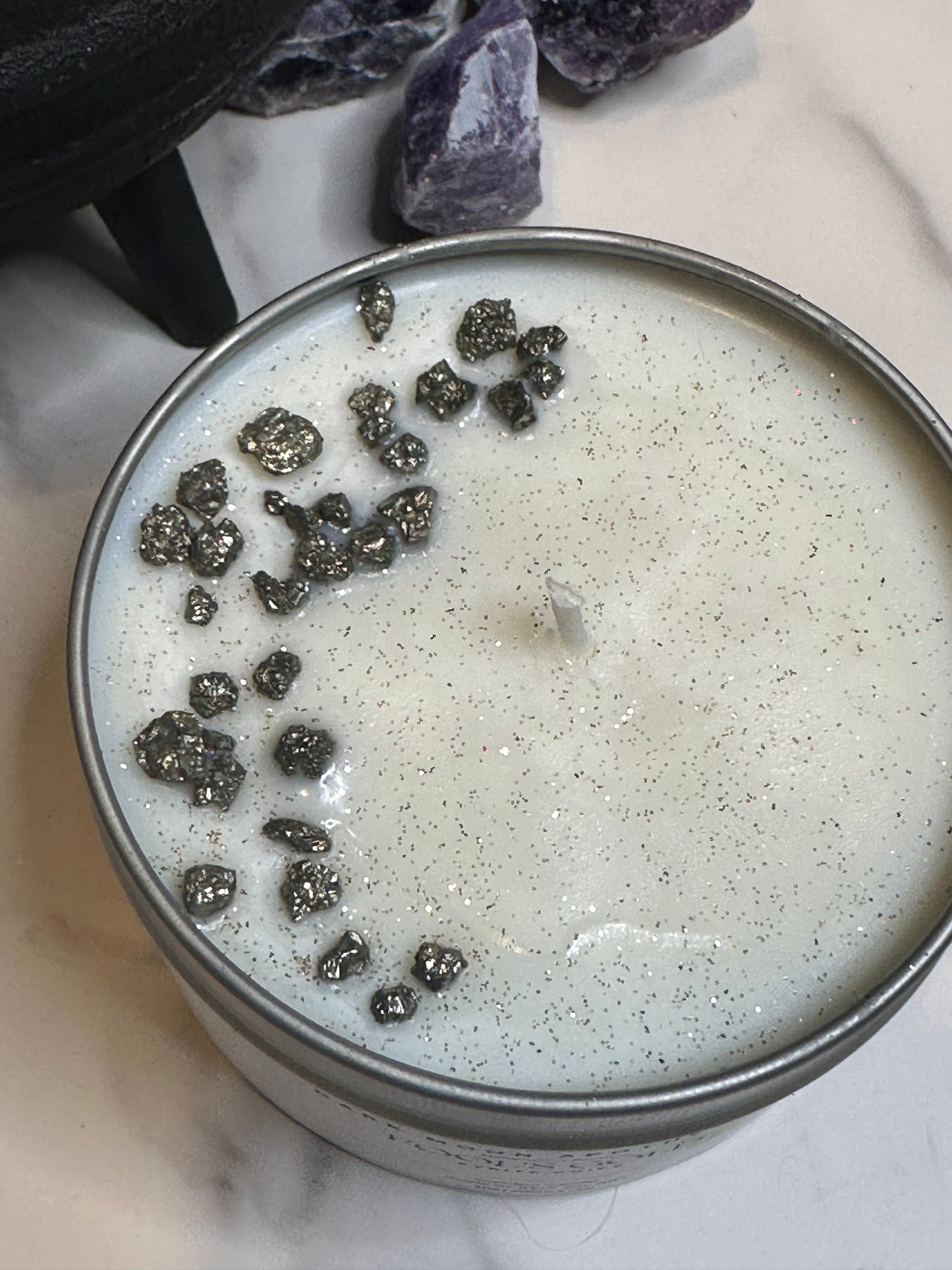 tin candle with pyrite crystal chips