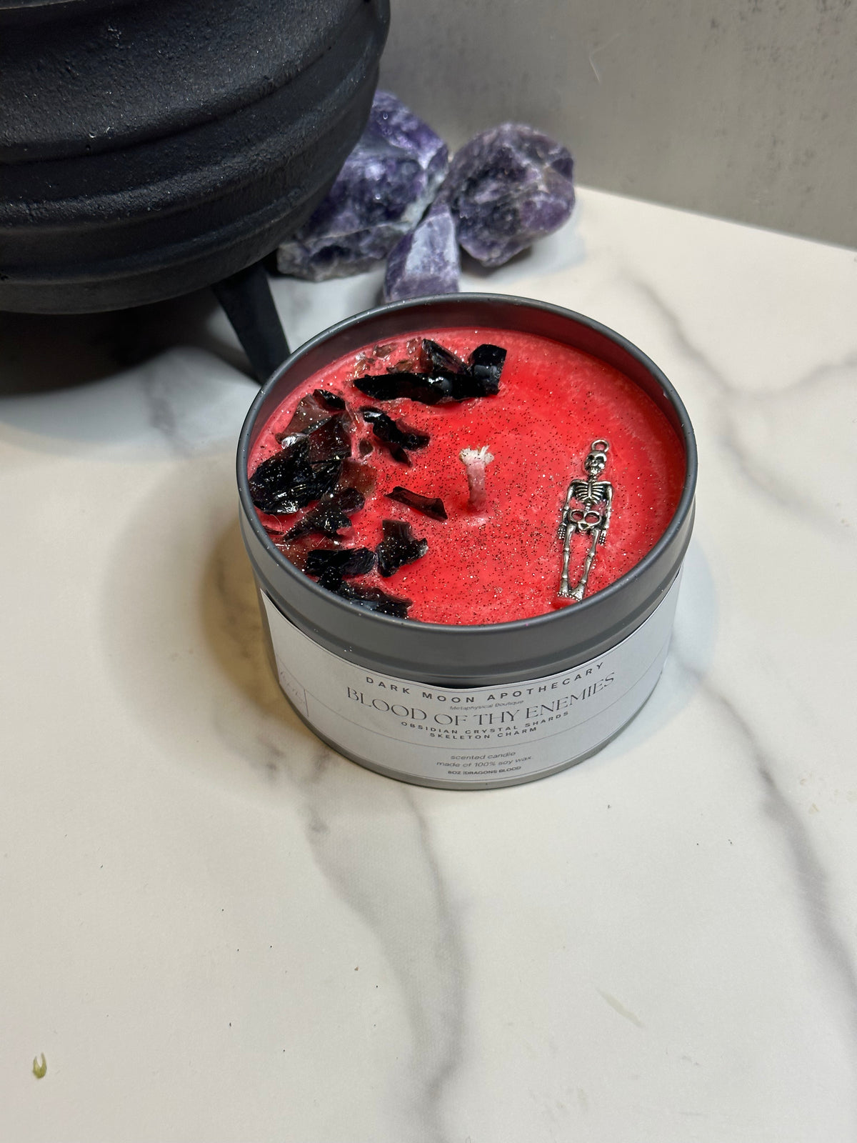 tin candle Blood of my enemies with obsidian & skeleton charm
