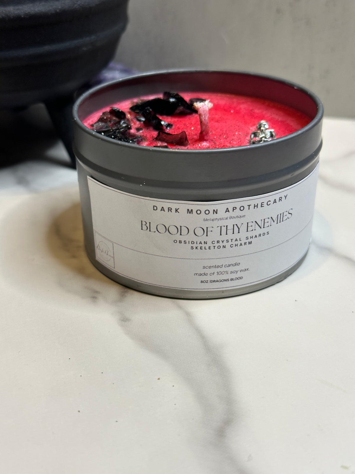 tin candle Blood of my enemies with obsidian & skeleton charm